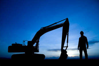 JMS Contractors Groundwork and Civil Engineering Norfolk Digger and worker in silhouette